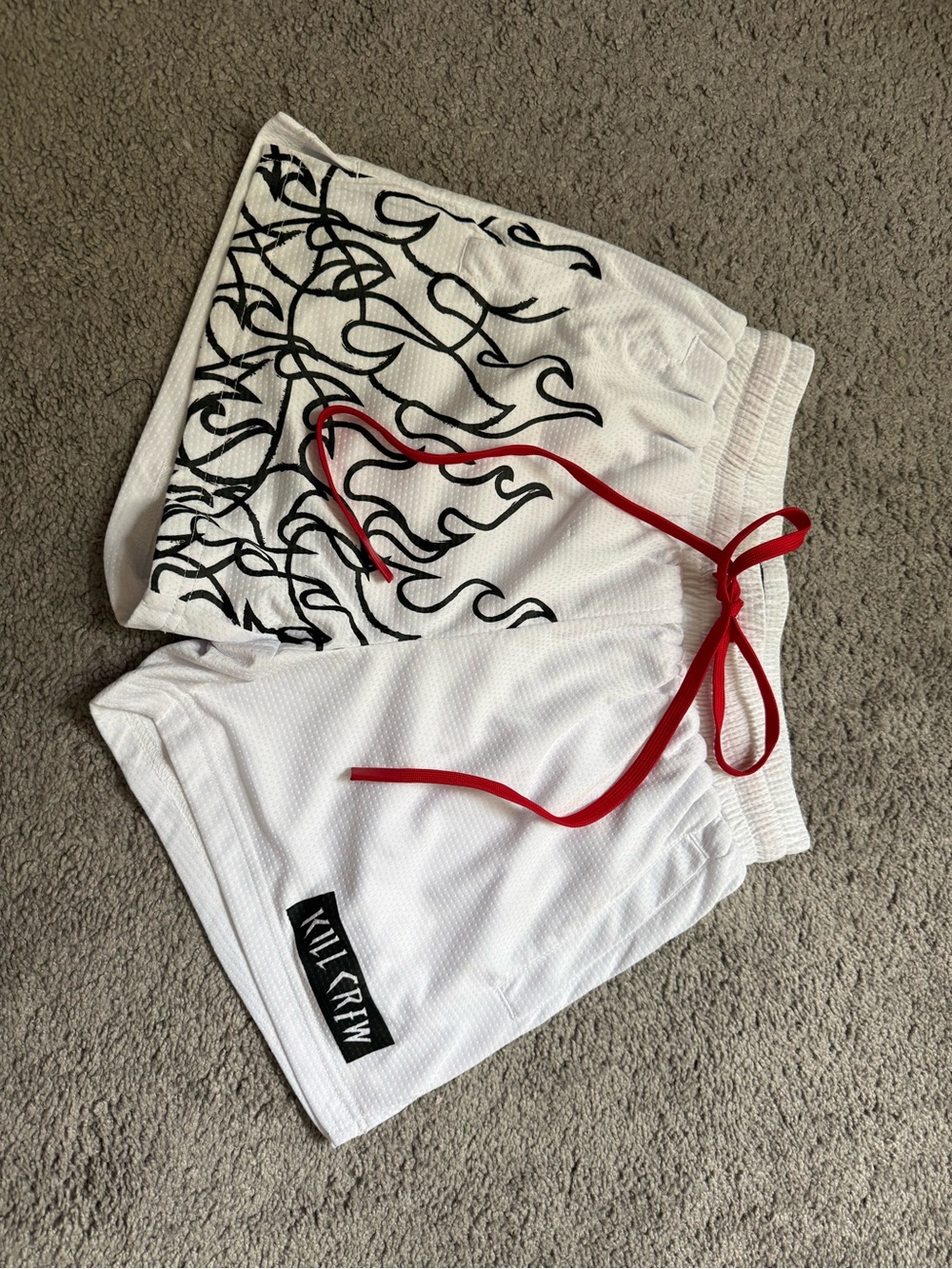 Kill Crew White Athletic Shorts with Black Flame Print and Red Drawstring